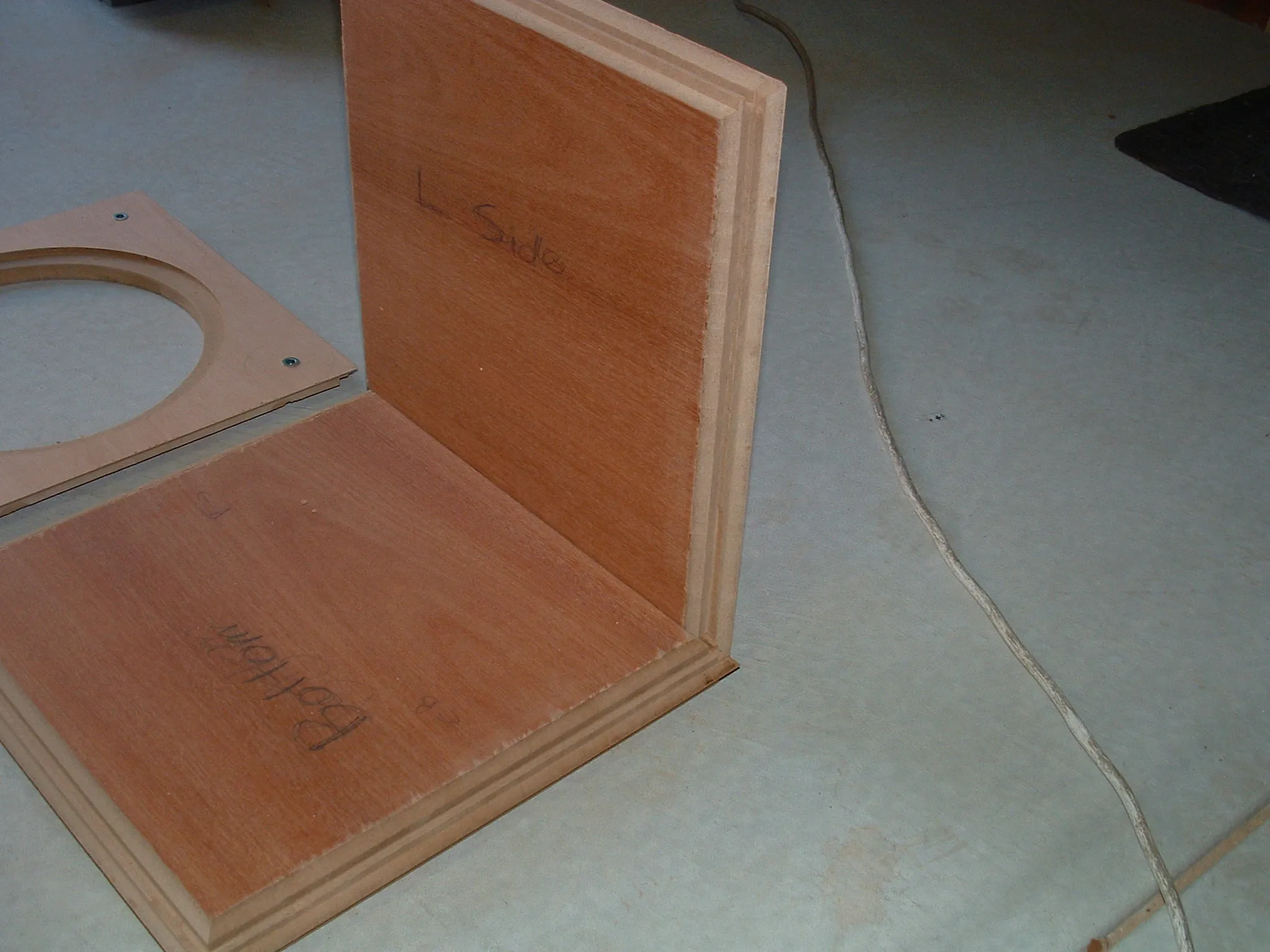 DIY subwoofer project: cutting or sizing cabinet panels.