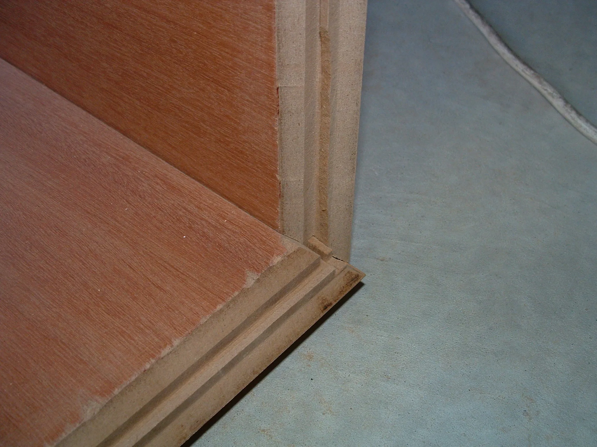 Lock miter joint routing: cutting dados on a panel.