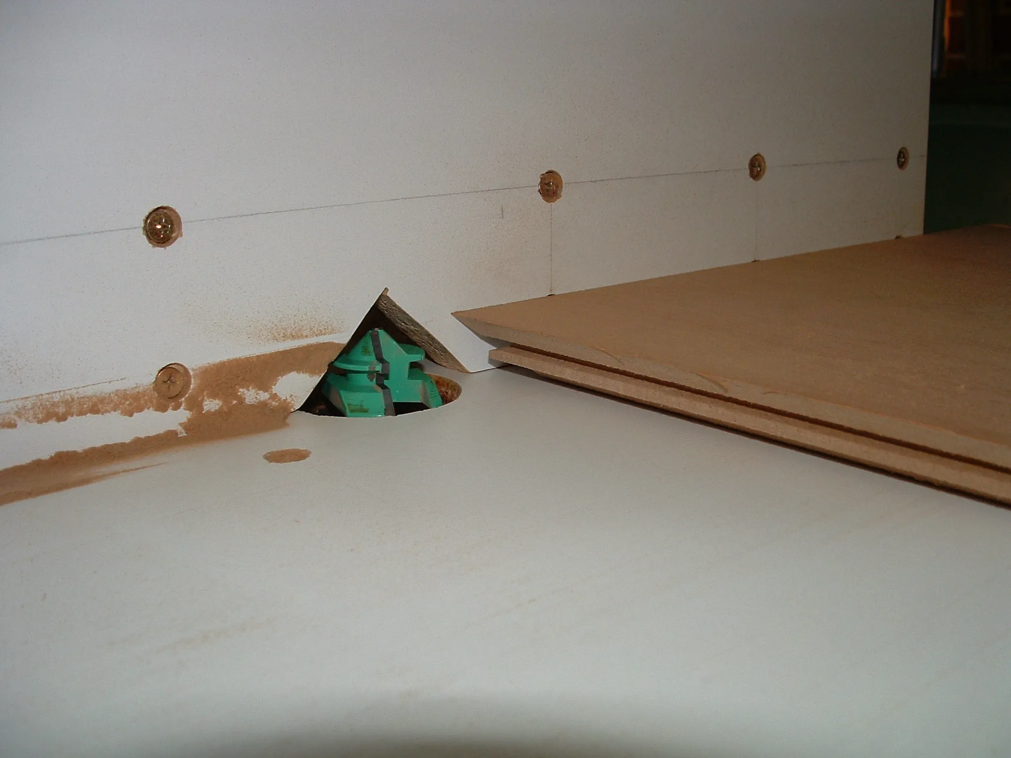 Lock miter joint routing: test cut or assembled corner sample.