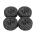 Product photo of small knobby black rubber RC crawler-style tyres on silver wheel rims, as sold for press-fit installation on compact hub motors.